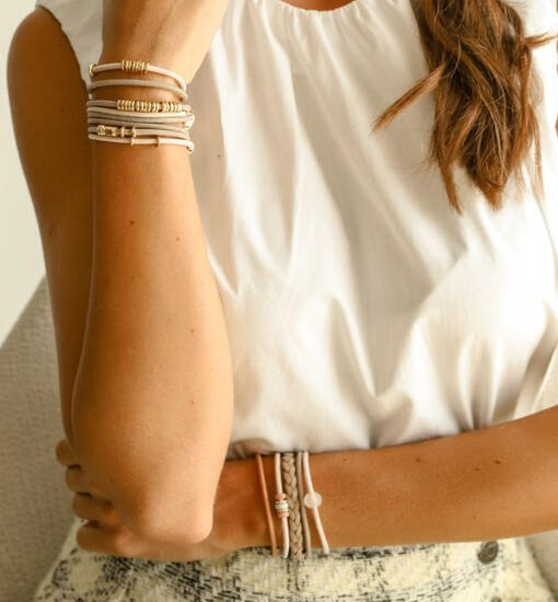 By Lilla luxury bracelet hair ties — functional fashion accessories that double as chic bracelets and no-damage hair ties, designed to elevate style from day to night."